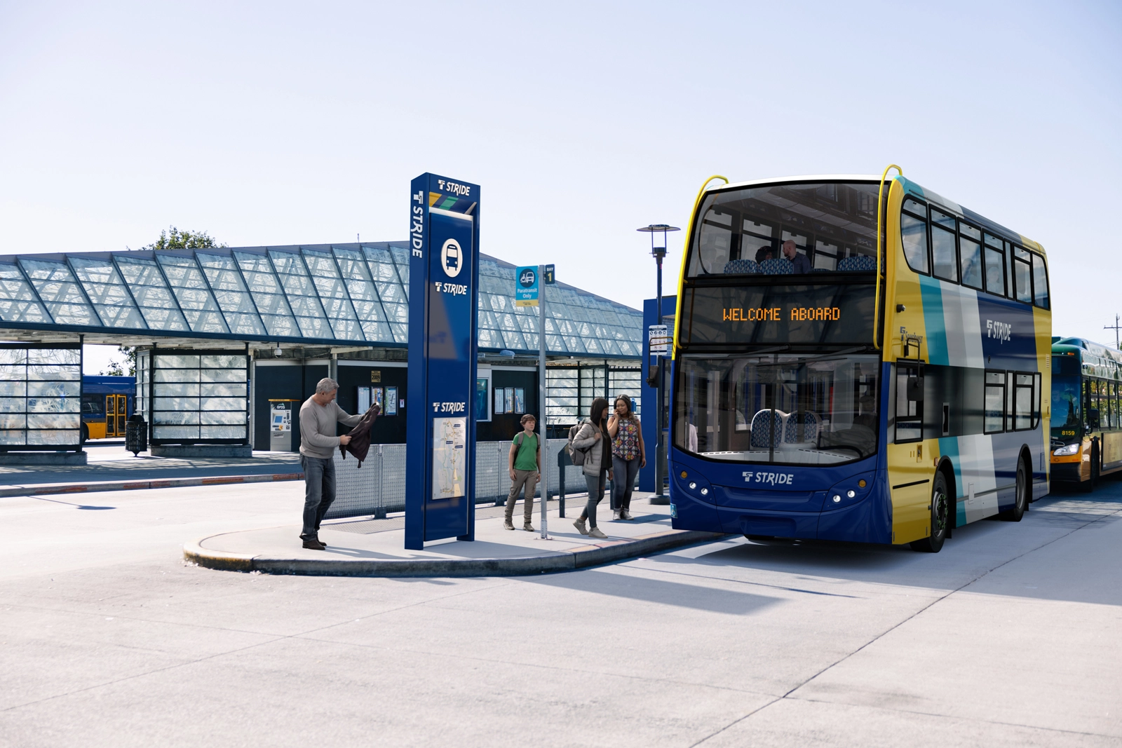 A double-decker battery-electric Stride bus at the Burien Transit Center.
